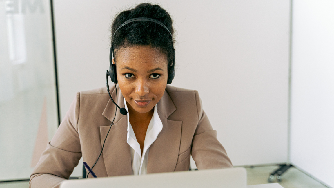 An agent talking via headset.